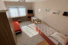 1-2-Bettzimmer